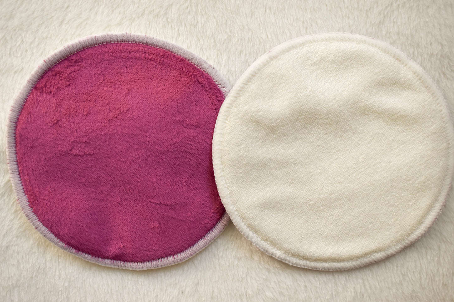 Reusable organic bamboo nursing pads in fuchsia from Fourth Trimester Mama