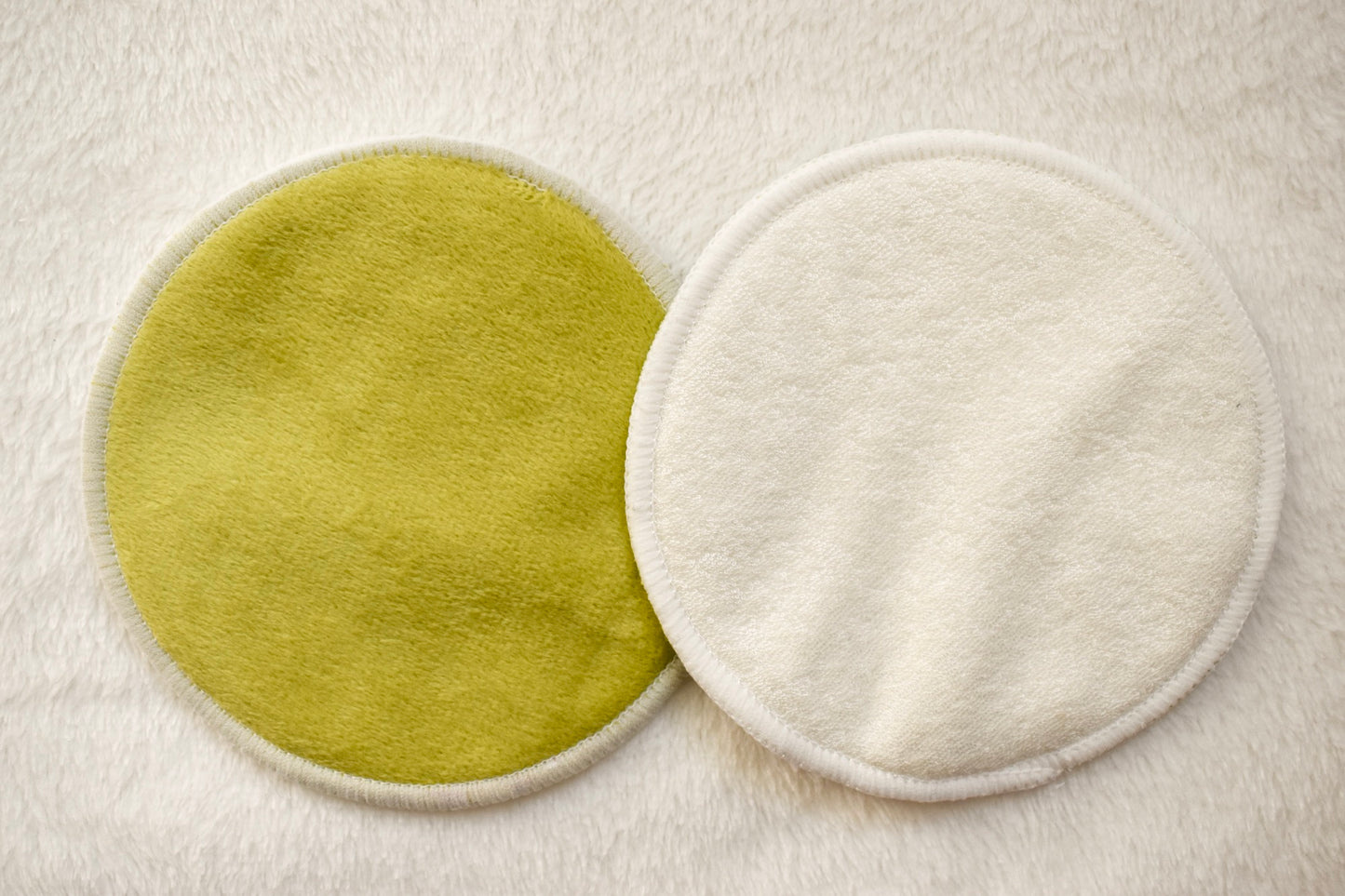 Reusable organic bamboo nursing pads in green from Fourth Trimester Mama