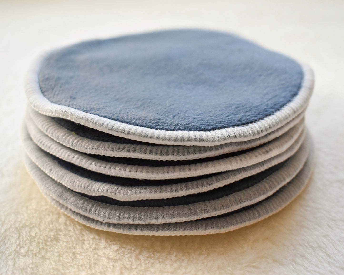 Reusable organic bamboo nursing pads in blue from Fourth Trimester Mama