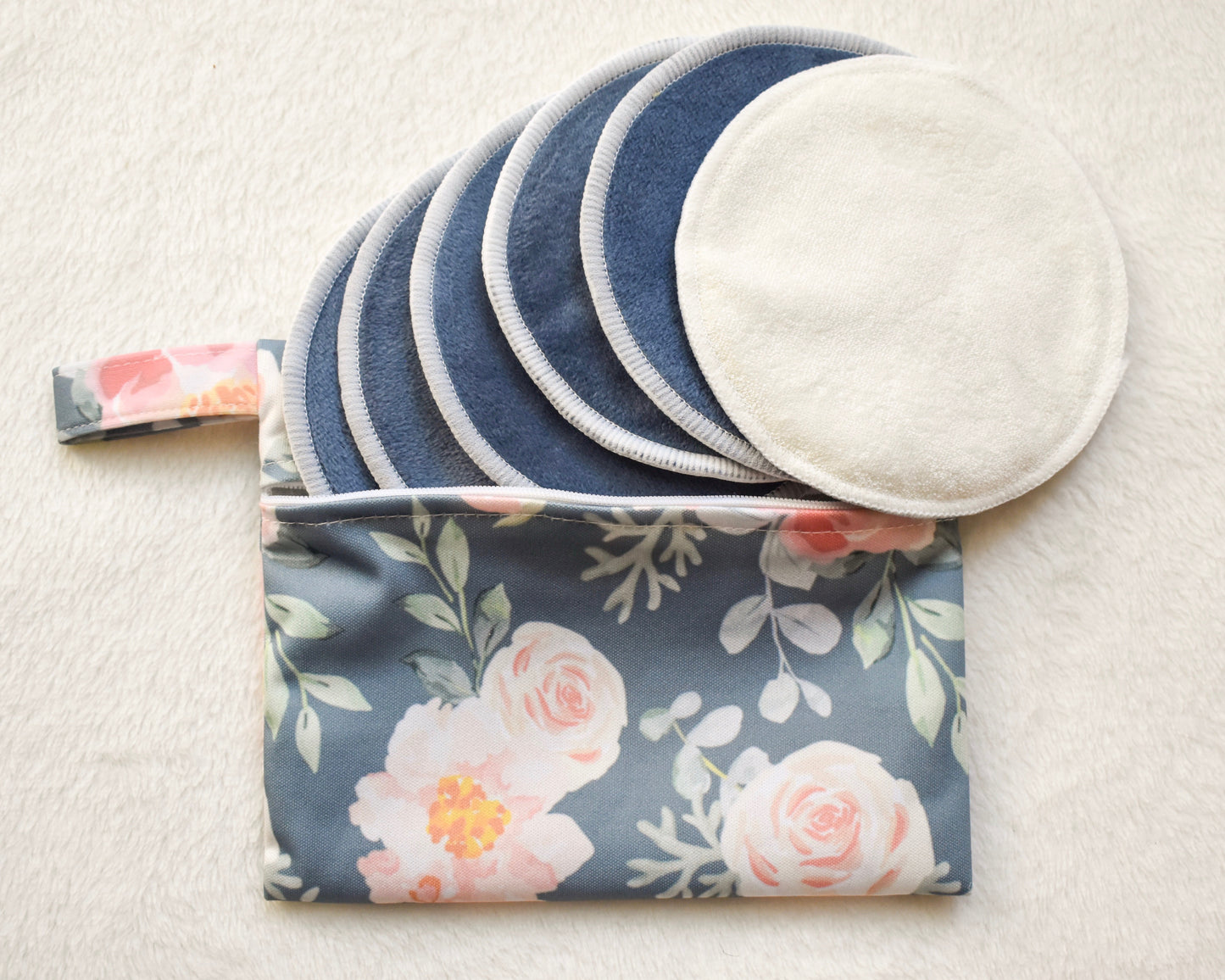 Reusable organic bamboo nursing pads in floral carrying pouch from Fourth Trimester Mama